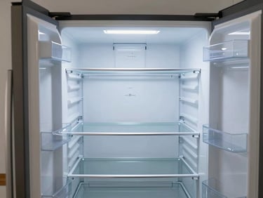 Modern refrigerator interior with clean shelves and soft LED lighting