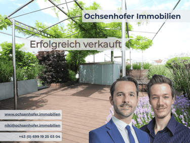 Two real estate agents from Ochsenhofer Immobilien standing before a successfully sold rooftop terrace.