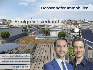 Ochsenhofer Immobilien agents smiling in front of a modern rooftop terrace with a city view, successfully sold.