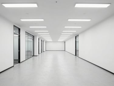 Wide environmental shot of a pristine, empty commercial office corridor with high-key fluorescent lighting, clean industrial environments, sharp focus, professional corporate tones, 35mm