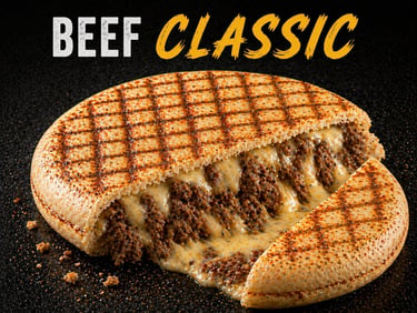 A classic grilled beef TOASTIS sandwich with melted cheese and seasoned ground meat