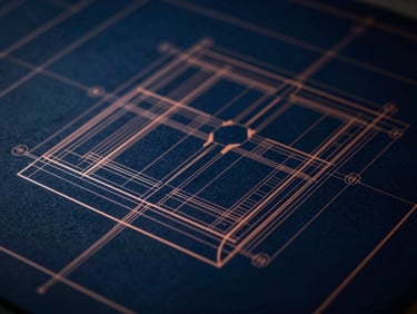Extreme close-up of a technical architectural blueprint with sharp geometric lines, cool blue tones, and warm copper highlights, dramatic low-key lighting.