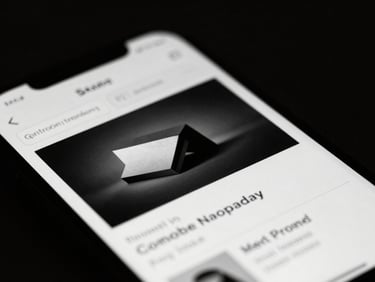 Macro close-up of a sleek, dark smartphone displaying a high-conversion website interface, dramatic chiaroscuro lighting, 35mm lens