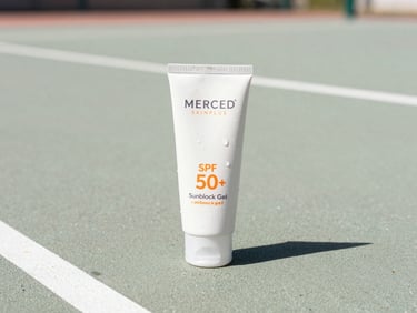 Product shot of MERCED Skinplus Sunblock Gel SPF 50+ bottle, sweat droplets on the bottle, on a sunny outdoor court surface, clean sporty pastel tones.