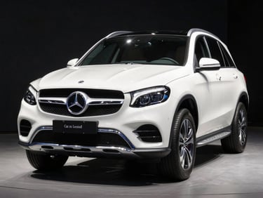 Front three-quarter view of a white Mercedes GLE SUV on a polished showroom floor, overhead studio strobes catching the grille detail, dark background
