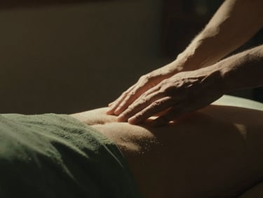 Gentle hands hovering over a body, soft light emanating, cinematic moody photography, rich sepia and moss green tones