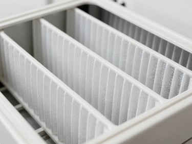 Crisp close-up of clean HVAC air filters being slotted into a modern ventilation system, technical and organized, bright daylight, 35mm