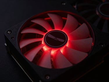 Macro shot of a graphics card cooling fan and heatsink, red neon backlighting, moody atmosphere, sharp focus