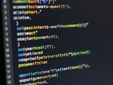 High-contrast close-up of clean code syntax on a dark monitor, crisp monospace characters.