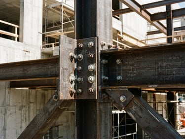 Stark industrial photography, harsh direct sunlight, extreme close-up of structural steel beams bolted together, blueprint overlay lines faintly visible, sharp focus, 35mm lens