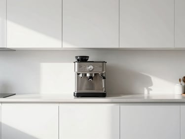 Straight-on medium shot of a pristine kitchen counter with a coffee station, bright natural light.