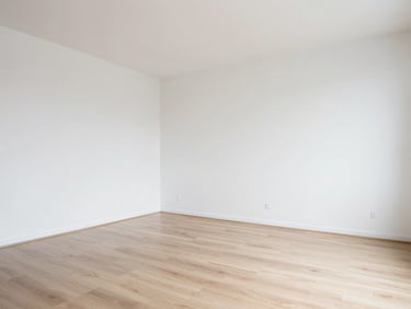An end-of-tenancy clearance of a modern apartment with pristine, empty rooms and polished floors.