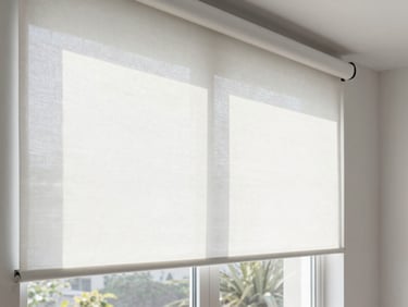 Close-up of a modern white roller blackout curtain installed in a bedroom, textured fabric blocking 100% of morning sunlight, architectural detail, 35mm