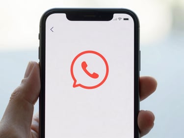 Close-up of a hand holding a smartphone, WhatsApp interface visible, with a subtle red warning icon overlay, bright natural daylight, clean white and blue tones, 35mm