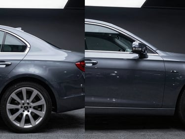 Side-by-side comparison of a crushed grey luxury sedan rear quarter panel before repair, and the perfectly smooth restored panel after paint prep, sharp studio lighting