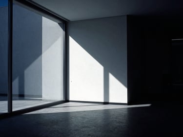 Minimalist interior of a modern financial office, glass partitions, sharp shadows, high-contrast black and white