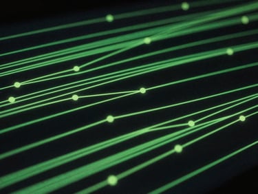 Stylized abstract representation of data streams and network nodes, glowing lime-green lines on a dark background, hinting at digital distribution, low-key, high-contrast.