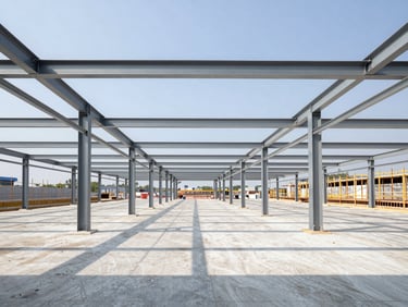 Wide shot of a clean, active commercial construction site interior, steel beams visible, natural daylight, high contrast, straight-on architectural angle.