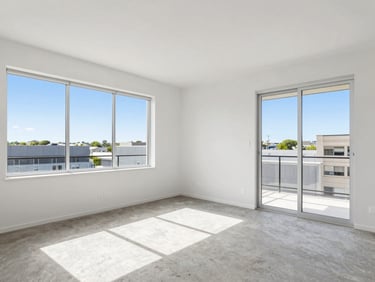 Bright natural daylight interior of a three-bedroom apartment living room, clean realistic colors, sharp focus, 35mm