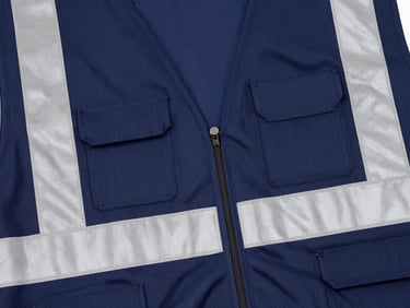 High-visibility safety vest with reflective strips and custom embroidery, heavy-duty fabric, bright daylight.