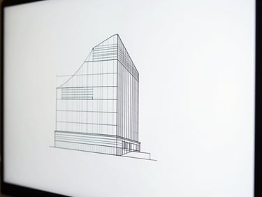 Macro close-up of abstract architectural diagram on a modern display, bright studio light, clean white backdrop, sharp shadows, minimalist composition.