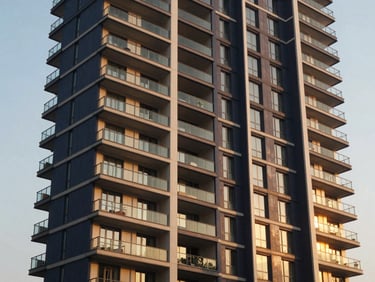 Modern high-rise apartment building facade with balconies and glass railings, reflecting golden hour light, urban Indian setting.