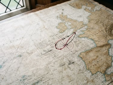Wide shot of a vintage maritime map with handwritten annotations, soft diffused library light, aged paper tones, macro detail.