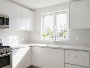 Bright, sunlit modern kitchen, sparkling stainless steel appliances, zero-residue countertops, clean white cabinets, wide-angle