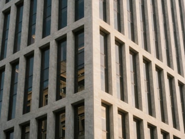 Architectural detail of a modern, secure financial building in Singapore, clean lines, soft light, muted tones, medium-format film