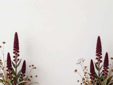 A sculptural arrangement featuring burgundy sanguisorba and dried seed heads, framed by expansive white negative space, minimalist composition, soft natural daylight.