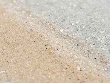 Macro close-up photography of natural quartz stone carpet texture, warm sand tones, clean mineral grain, soft overcast light