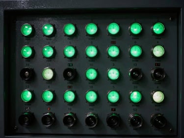 Detailed view of an automated water control panel with glowing green indicators, high-contrast, industrial setting, 35mm lens