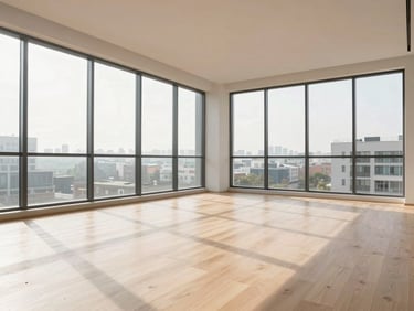 Spacious condo living room, soft morning sun through large windows, minimalist decor, light wood floors, real estate editorial, 35mm lens