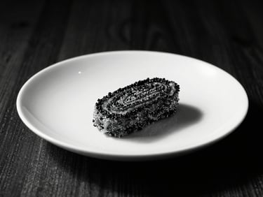 Close-up of a perfectly plated main meal, high-contrast lighting, deep blacks, crisp whites, warm wood accents, strong shadows, 35mm lens