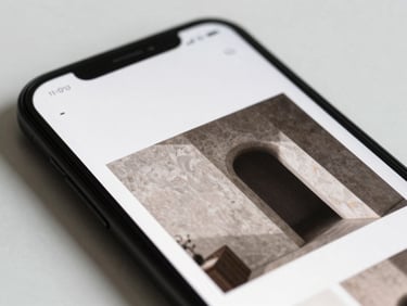 Macro detail of a sleek architectural portfolio website on a mobile screen, high-contrast layouts, sharp 35mm focus