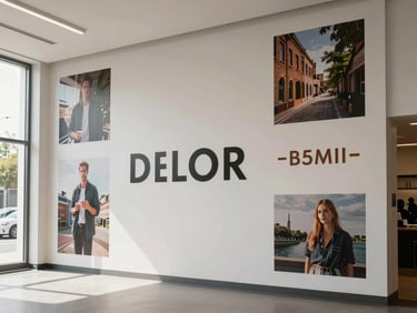 Wide environmental shot of a branded retail or exhibition space with printed wall graphics and signage system applied to interior surfaces, natural daylight from side windows, no people, clean architectural framing