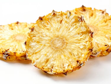 Macro shot of perfectly preserved dehydrated pineapple slices on a white background, bright studio light, showing fiber structure