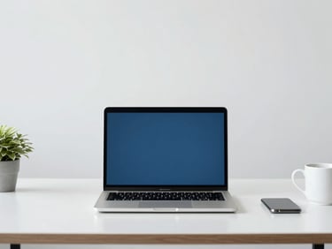 Straight-on medium shot of a clean minimalist workspace, hands typing on a laptop, bright neutral daylight, soft corporate blue tones, 35mm