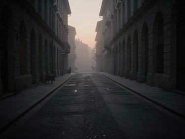 A distant foggy city street at dusk, architectural shadows, moody atmospheric photography, desaturated tones