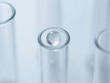 Macro shot of a purified protein crystal structure in a microcentrifuge tube under cool laboratory lighting, sterile white background, 50mm