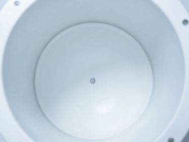 Macro shot of a pristine clean metal duct interior, bright cool white lighting, clinical precision