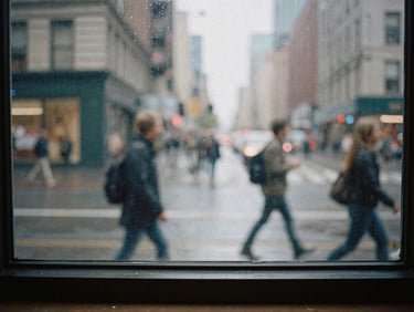 Wide shot of a bustling city street seen through a rain-streaked window, blurred motion of pedestrians, muted colors, visible film grain, 35mm perspective.
