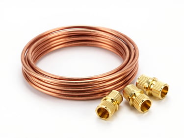 Bright high-key product photography of copper electrical wire coils and brass connectors on a clean white backdrop, crisp studio light, sharp focus, 50mm lens