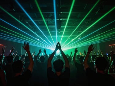 Crowd dancing with hands up under intense cyan and green lasers, club atmosphere