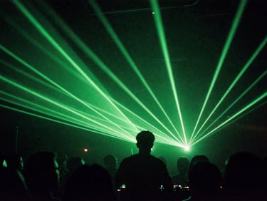 DJ performing mid-set under neon green strobe lights, close-up, high contrast, 35mm film grain