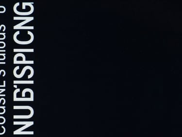 Wide panoramic 21:9 frame, extreme close-up of a high-contrast WebGL interface component, dramatic screen-glow against deep blacks, sharp typography visible on the left third, expansive negative space on the right.