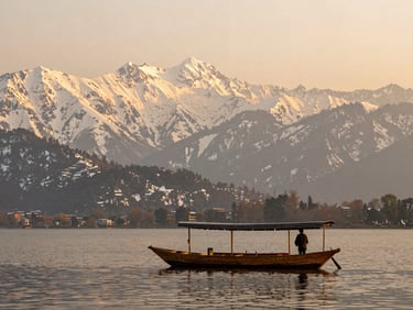 A breathtaking view of snow-capped mountains in Kashmir, a traditional wooden shikara boat floating on Dal Lake, soft golden hour glow.