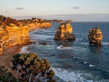 Wide panoramic view of rugged coastal cliffs in South Australia, deep blue ocean, golden hour light hitting the sandstone cliffs, warm editorial travel photography
