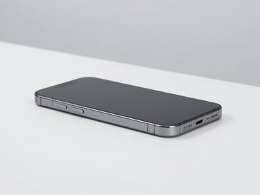 Sleek new smartphone on a minimalist surface, soft shadows, sharp focus