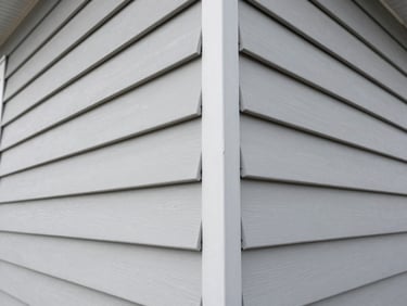 Detailed shot of newly installed architectural siding panels with clean, precise joints on a Calgary home.
